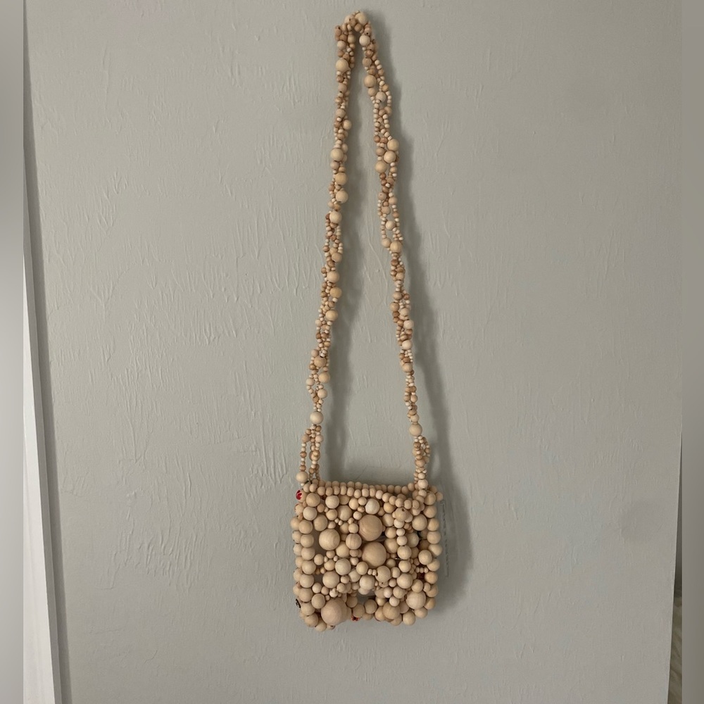 Susan Fang designer wood beaded passport bag. Perfect for summer!